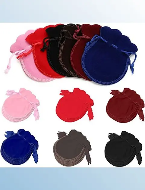 POCHETTE RONDE EN VELOUR NOIR H.9X7 CM